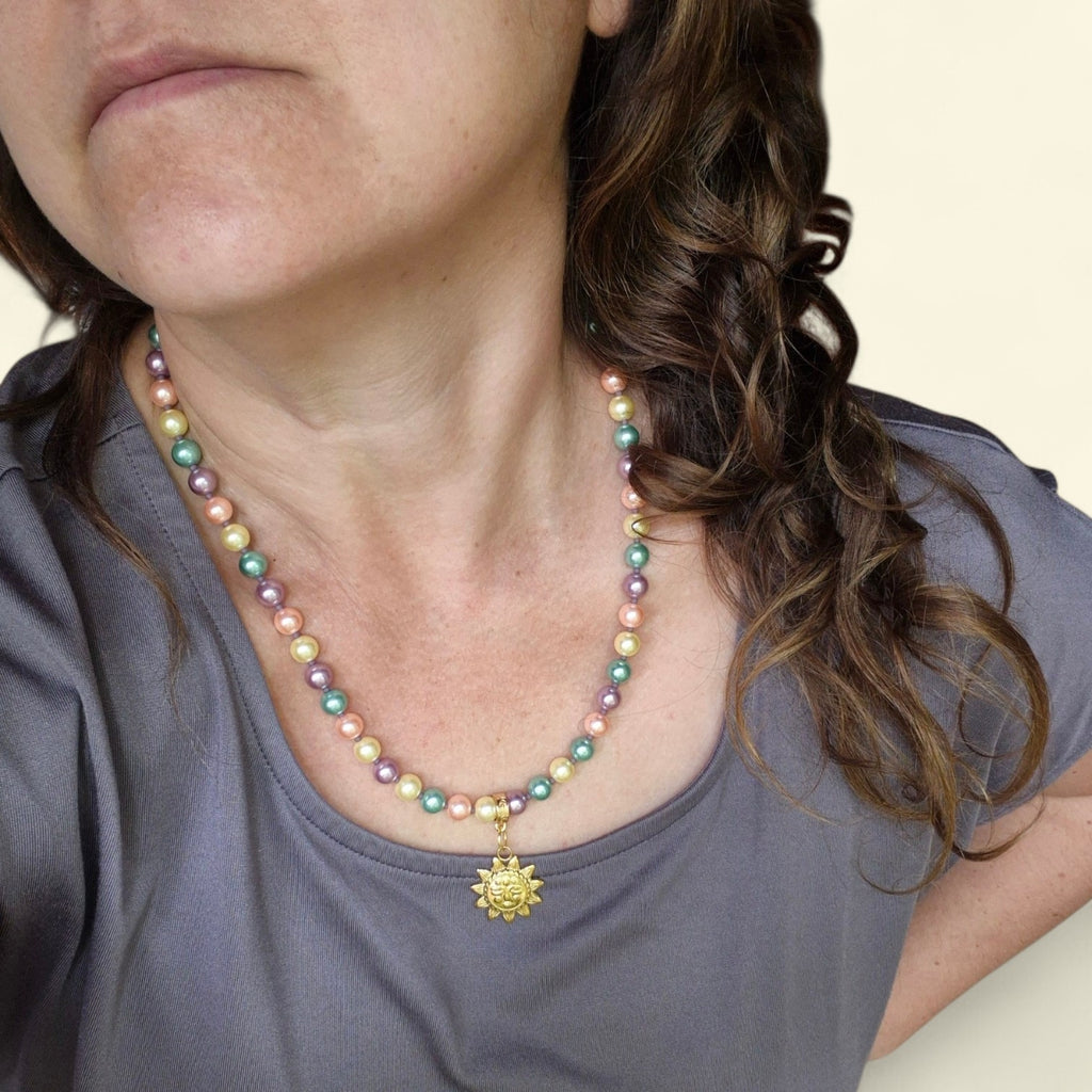Collar perlas y sol