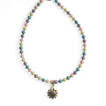 Collar perlas y sol