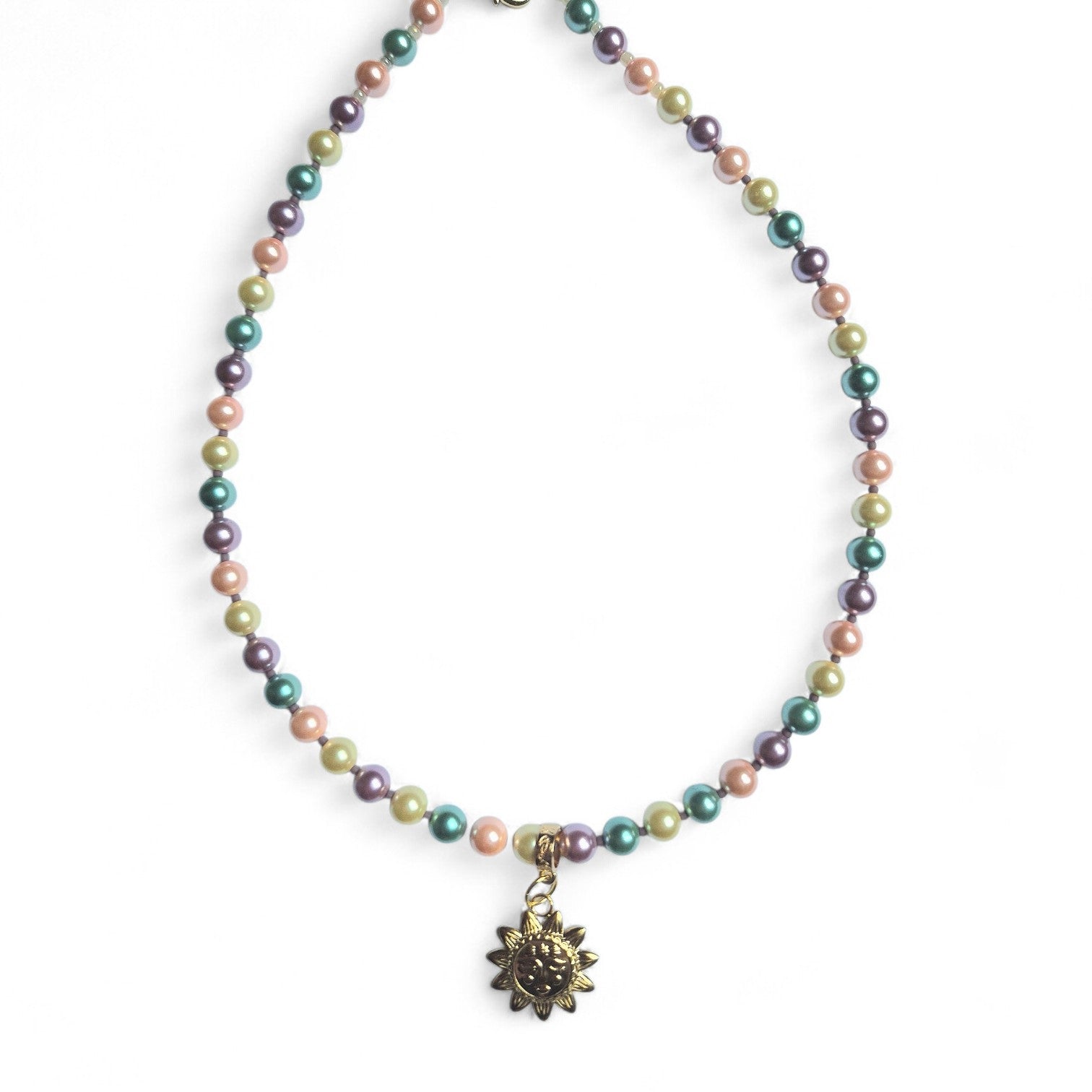 Collar perlas y sol