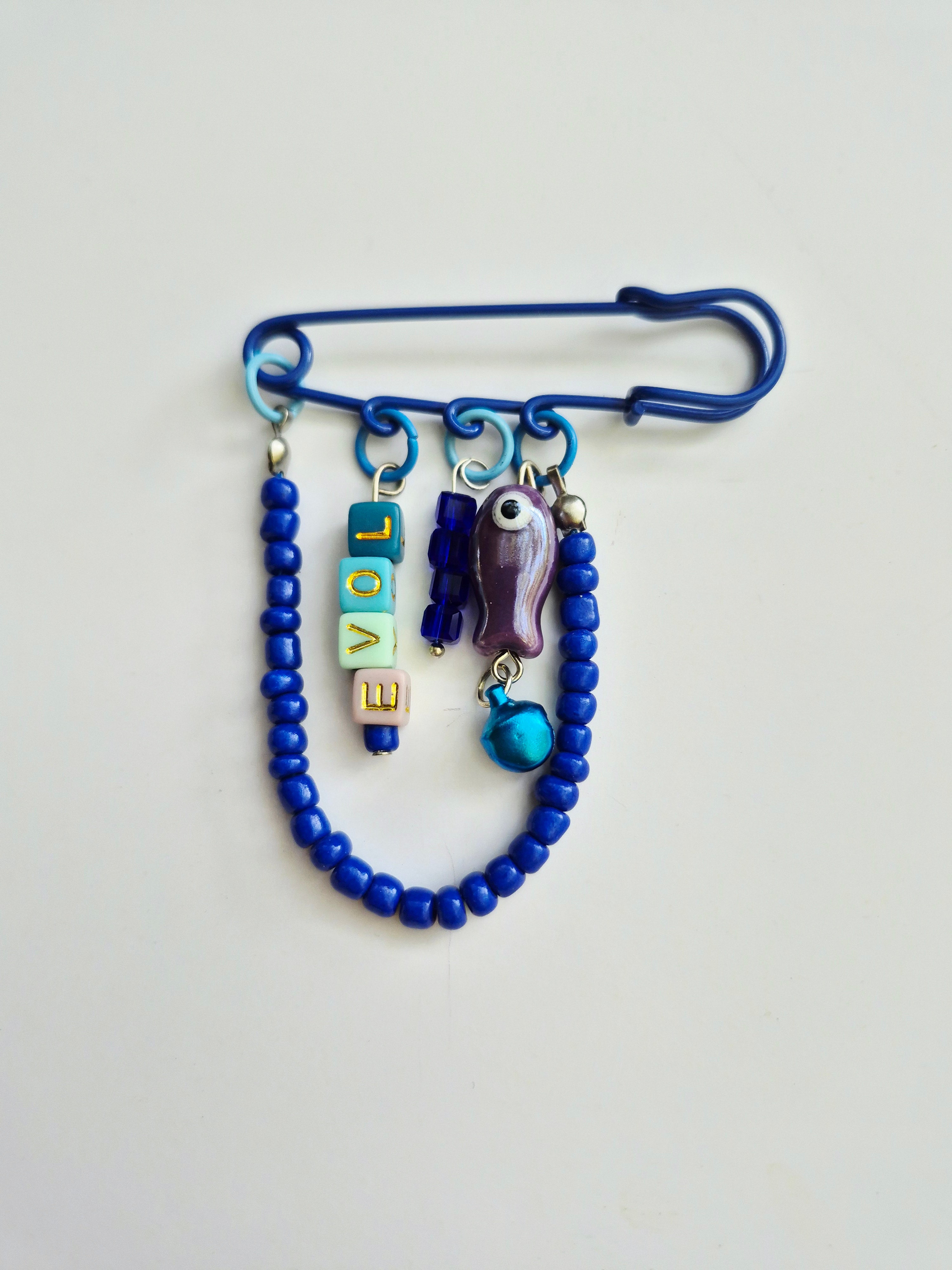 Broche colores