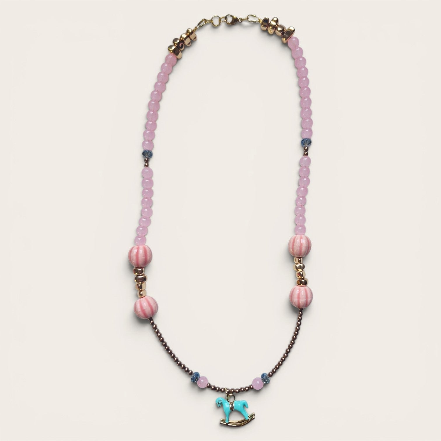 Collar de Mostacillas Rosado con Caballito Turquesa