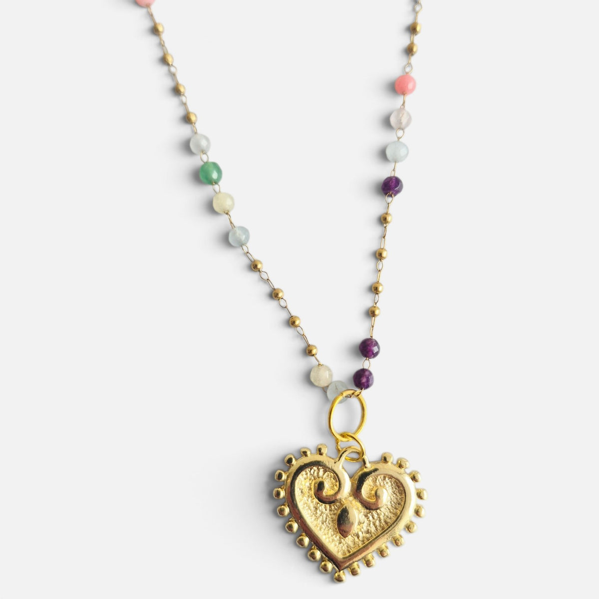 Collar corazón viajero