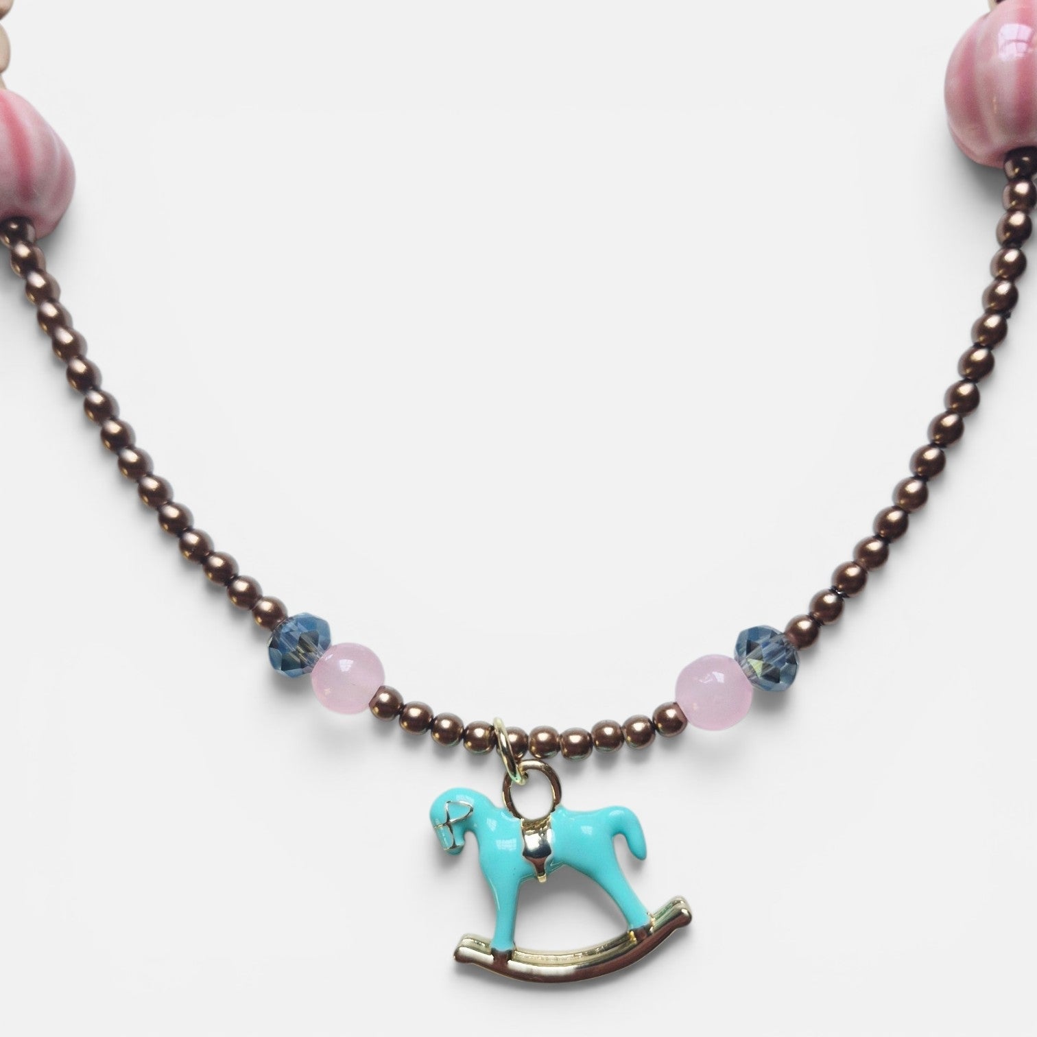 Collar de Mostacillas Rosado con Caballito Turquesa